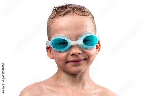 Preschooler boy in swimming goggles on a white isolated background. child in the pool. swimming is good for children