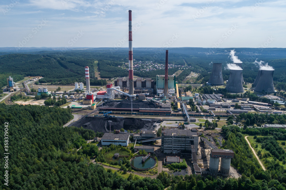 Obraz premium Chimneys and big heating plant powerhouse Siersza Trzebinia Poland aerial drone
