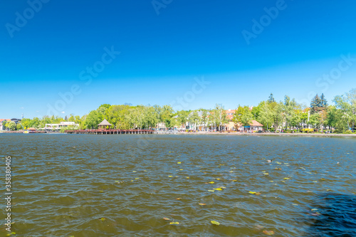 Drweckie lake with wooden pier at sunny day. photo