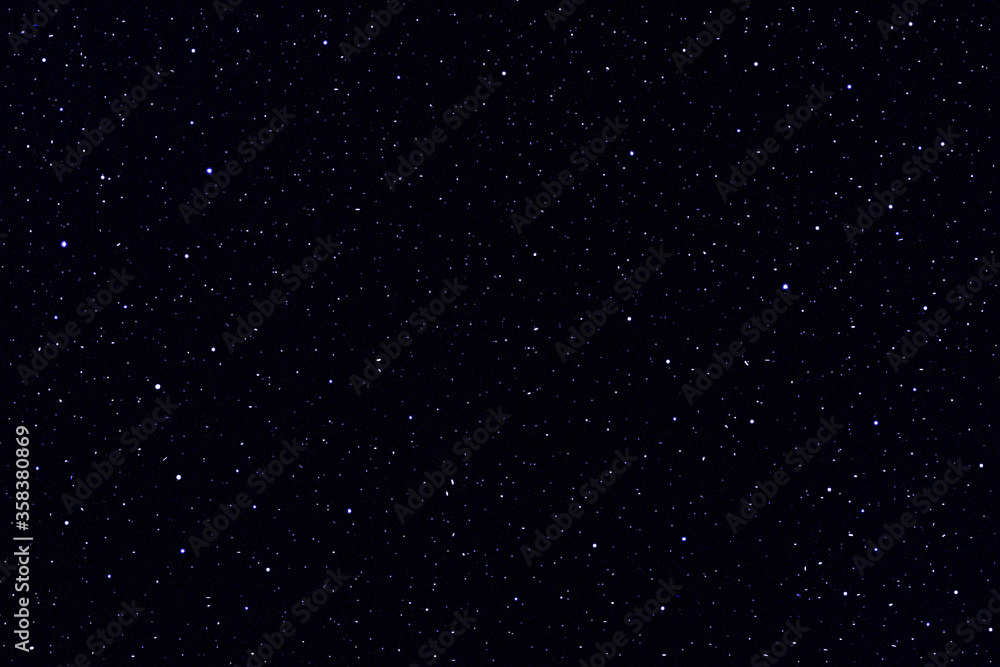 Starry night sky galaxy texture background.