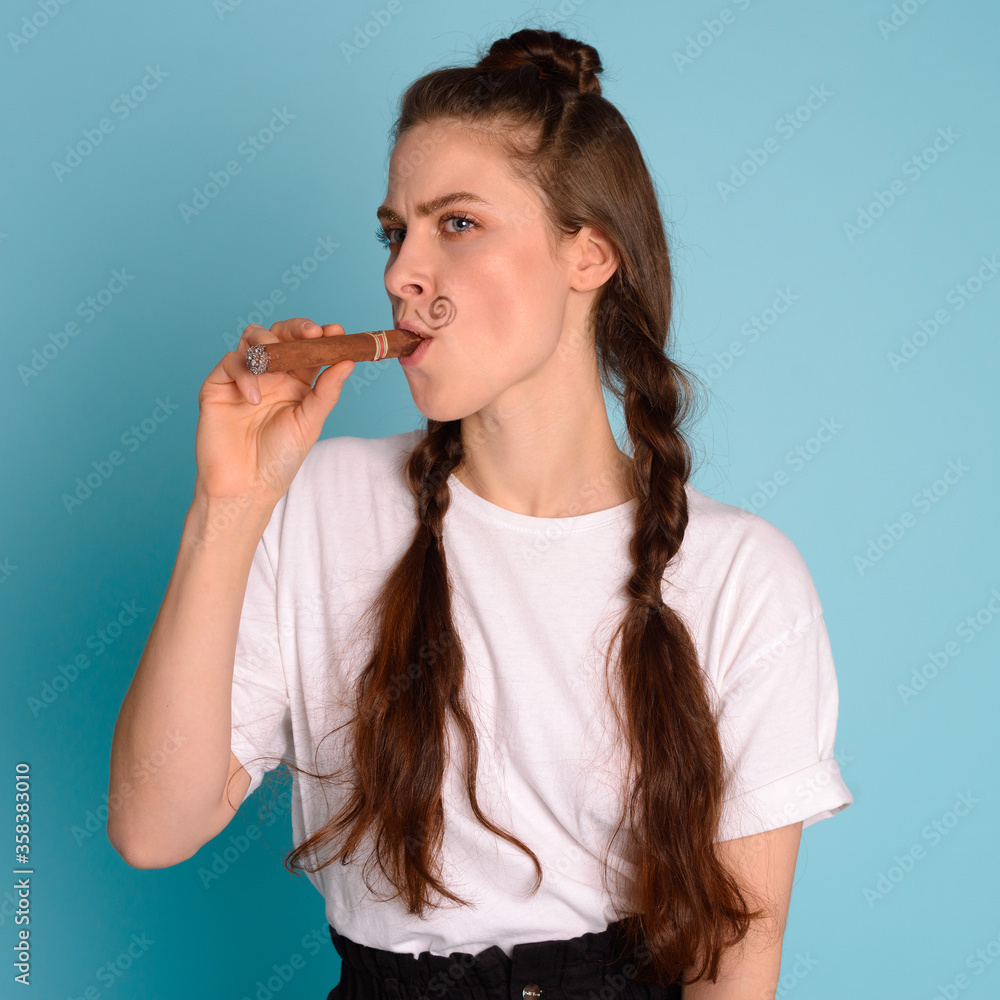 girl with funny mustache and a chocolate sigar girl with funny mustache and a chocolate sigar
