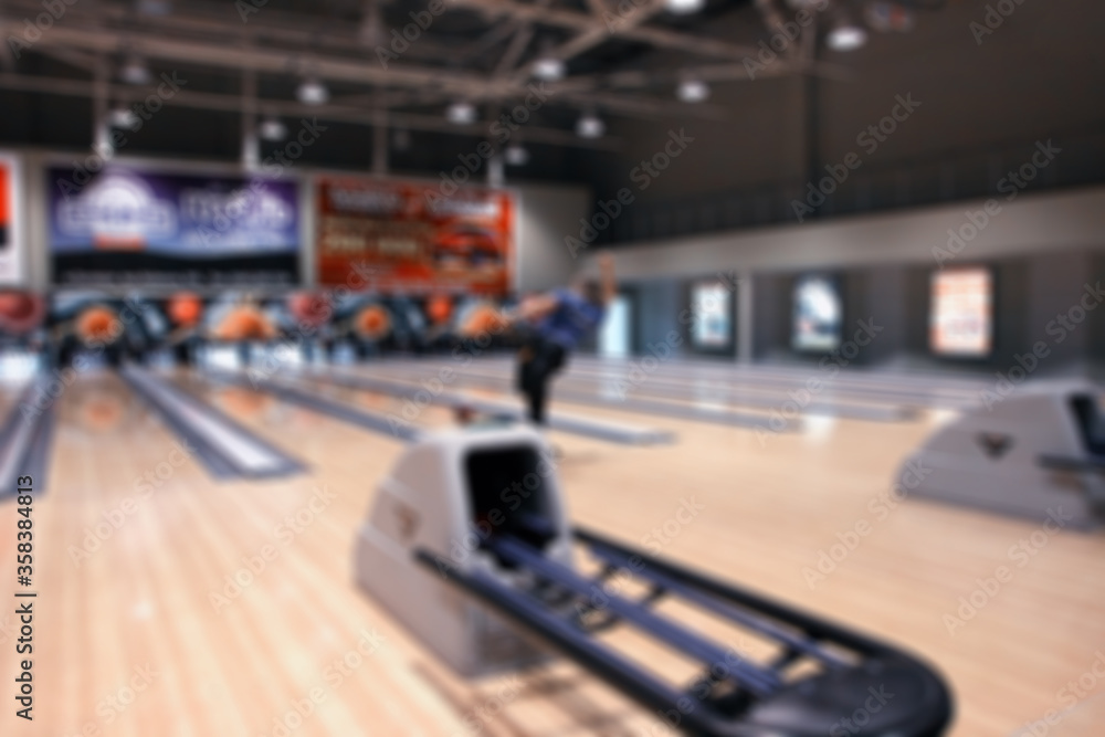 Blurred image of a bowling alley. Background texture.