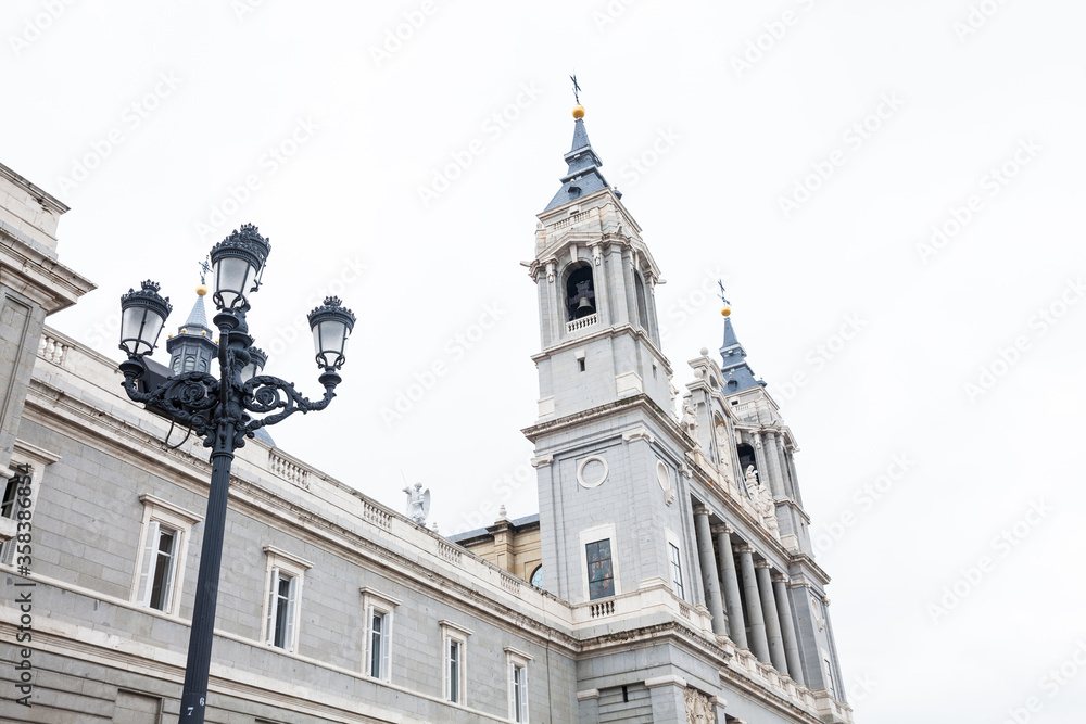 The historical Almudena Cathedral in Madrid city center on a rainy winter day in Spain