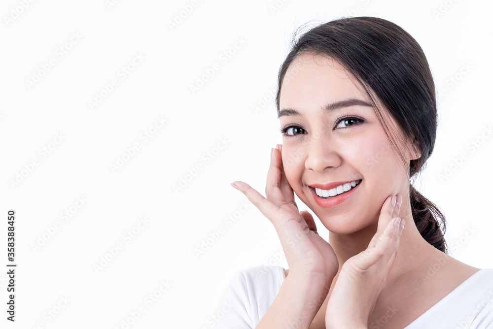 Portrait images of Asian young, pretty woman is 25 years old, She is smiling brightly, She has beautiful white and clean teeth, sparking eyes On white background to people and beauty concept. Portrait images of Asian young, pretty woman is 25 years old, She is smiling brightly, She has beautiful white and clean teeth, sparking eyes On white background to people and beauty concept.