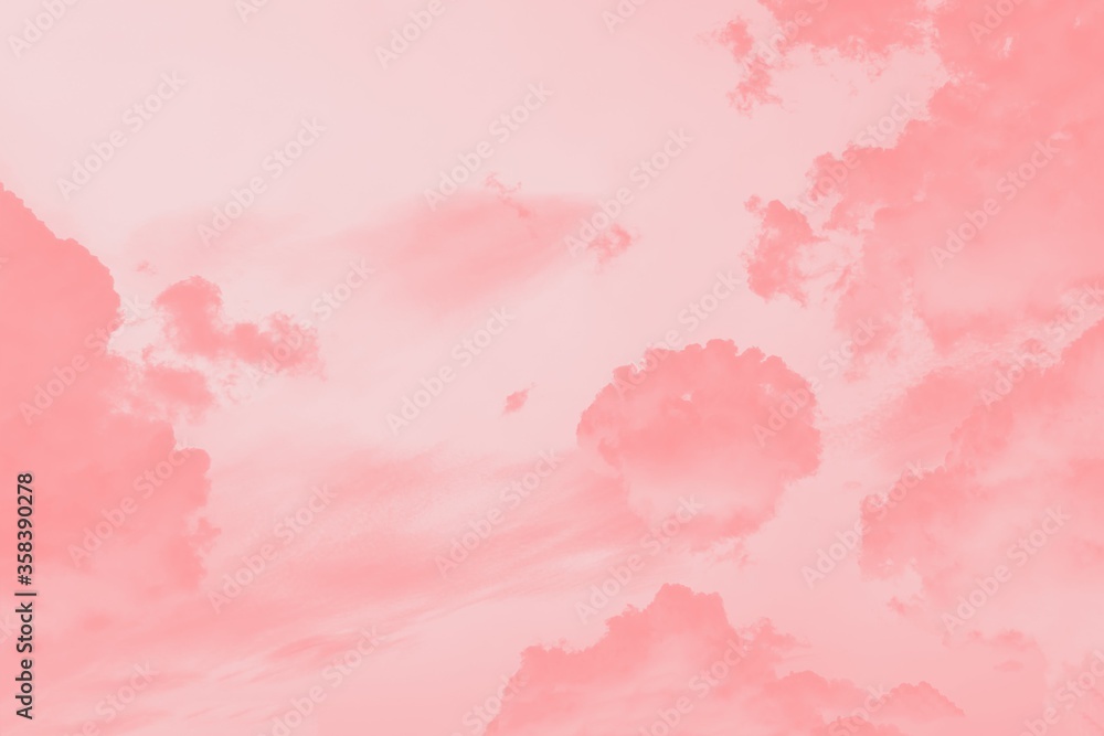 Pink coral clouds in the light pink sky Pink coral clouds in the light pink sky
