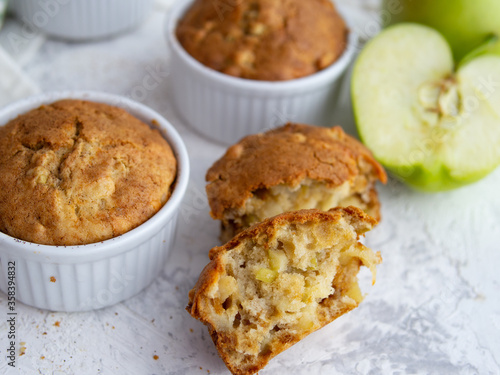 Muffin with cheese and apple. Fresh homemade cakes. Maasdam. Concept of healthy breakfast. Close up. Copy space.