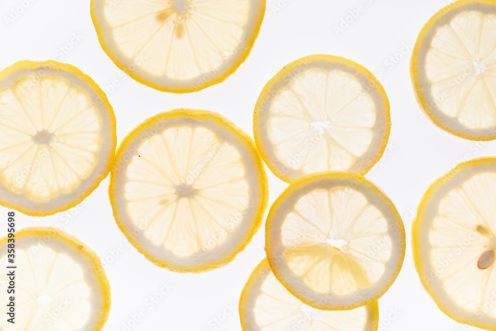 Slices lemon isolated on white background. Flat lay, top view. Food concept. Slices lemon isolated on white background. Flat lay, top view. Food concept.