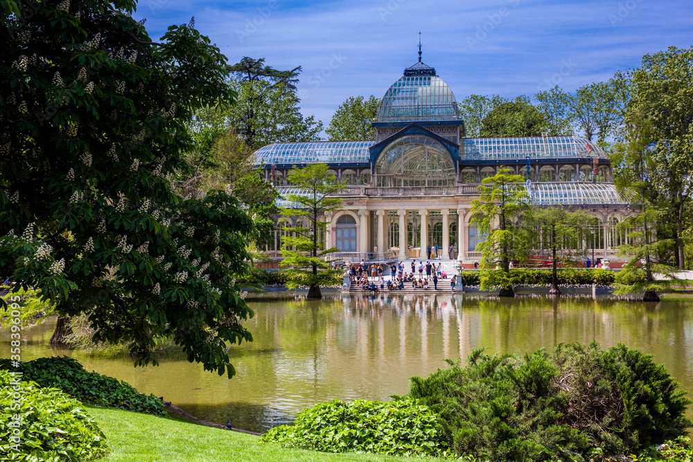 View of the beautiful Palacio de Cristal a conservatory located in El Retiro Park built in 1887 in Madrid