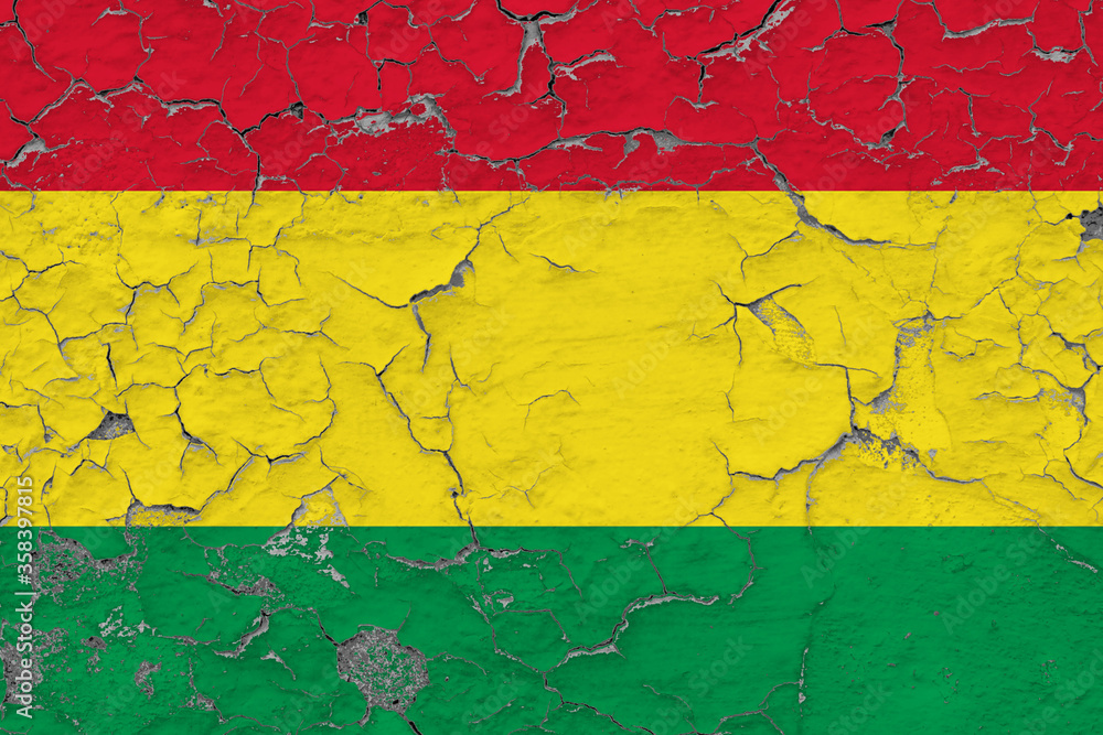 Bolivia flag close up grungy, damaged and weathered on wall peeling off paint to see inside surface. Vintage concept.