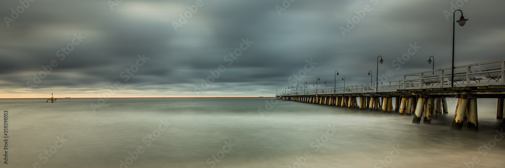stormy sunrise over the baltic sea in Gdynia Orlowo, Poland 