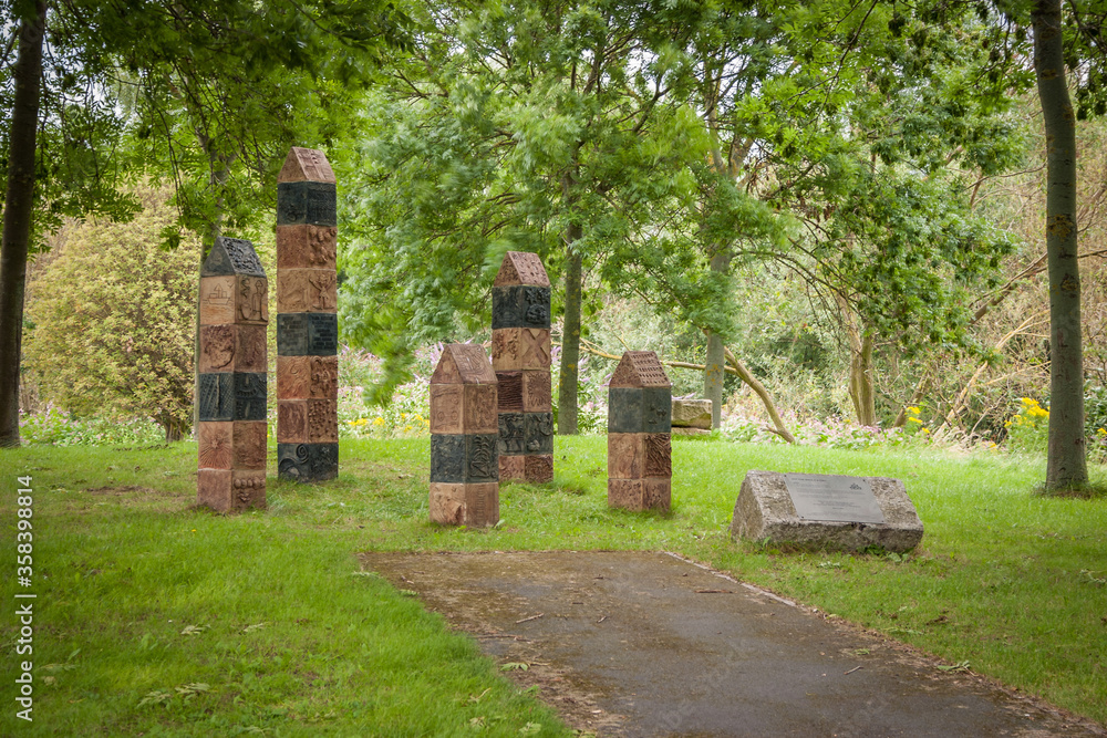 An interesting sculpture in a country park setting An interesting sculpture in a country park setting