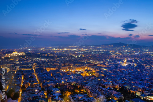 Amazing View on y Athens at magical blue hour (Acropolis of Athes at left corner)