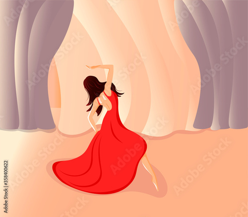 beautiful girl emotionally  and expressively dances on stage flamenco