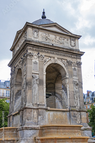 Fountain of the Innocents (Fontaine des Innocents, 1547 - 1550) at place Joachim-du-Bellay in Paris. Fountain of the Innocents is oldest monumental fountain in Paris, France.