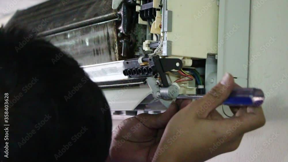 man working in factory with home air condoning cleaning man working in factory with home air condoning cleaning