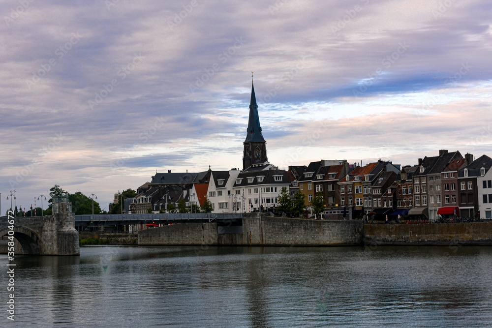 Panorama of Maastricht from river Maas or Meuse. The city is a capital of Limburg province and one of popular tourist destinations