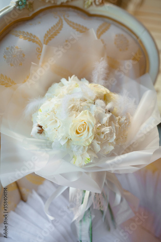 beautiful white bouquet of delicate natural flowers of roses