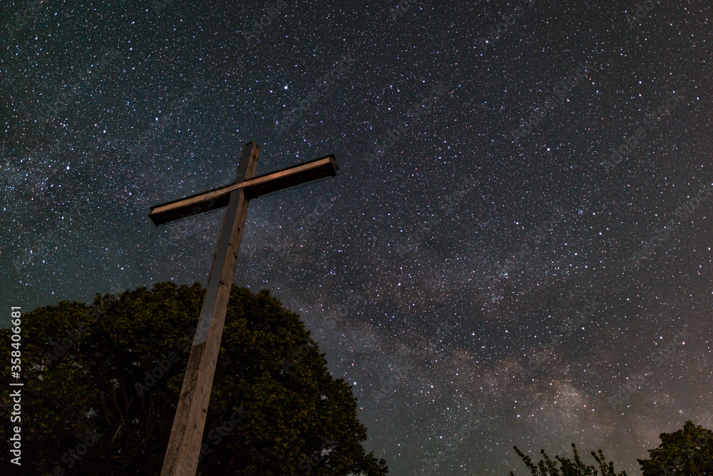 Cross reaching clear spangled sky Cross reaching clear spangled sky