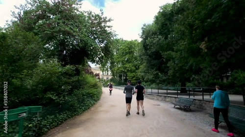 Wallpaper Mural Timelapse people running in the park. Parc Monceau Torontodigital.ca