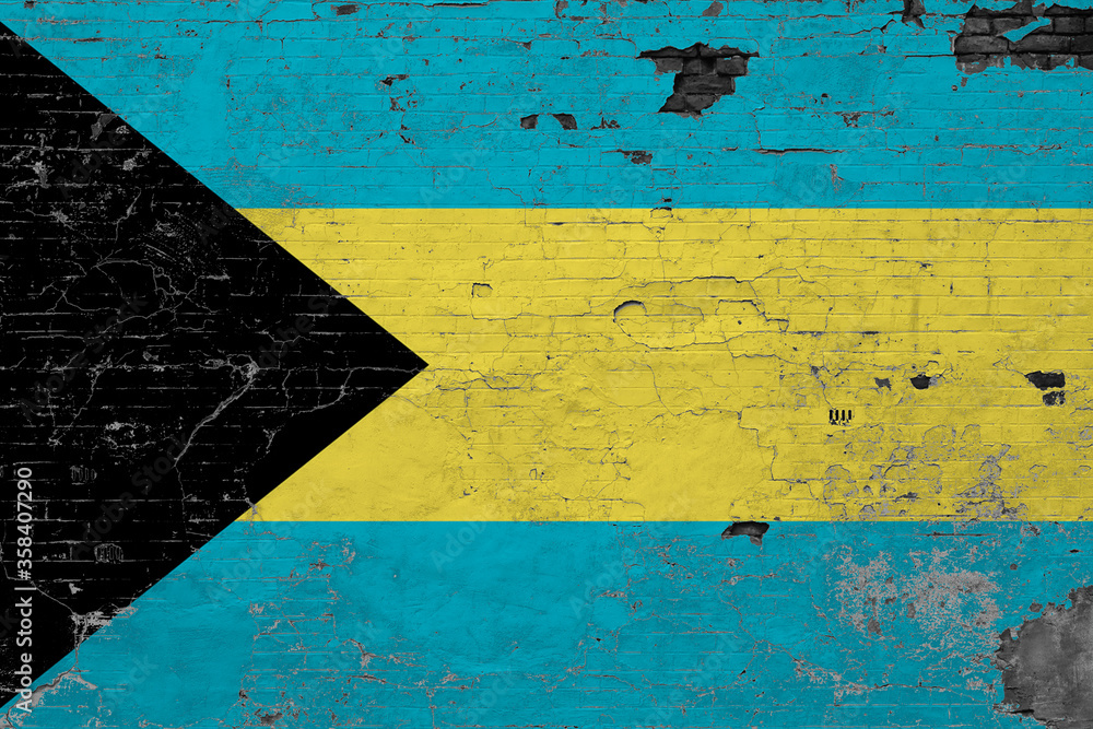 Bahamas flag on grunge scratched concrete surface. National vintage background. Retro wall concept.