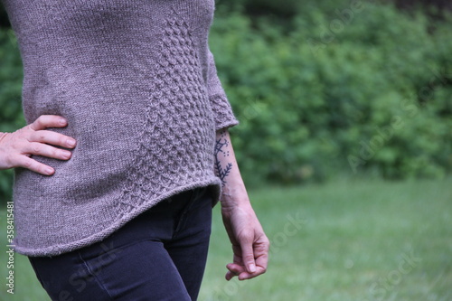 Woman wearing handmade knitted sweater