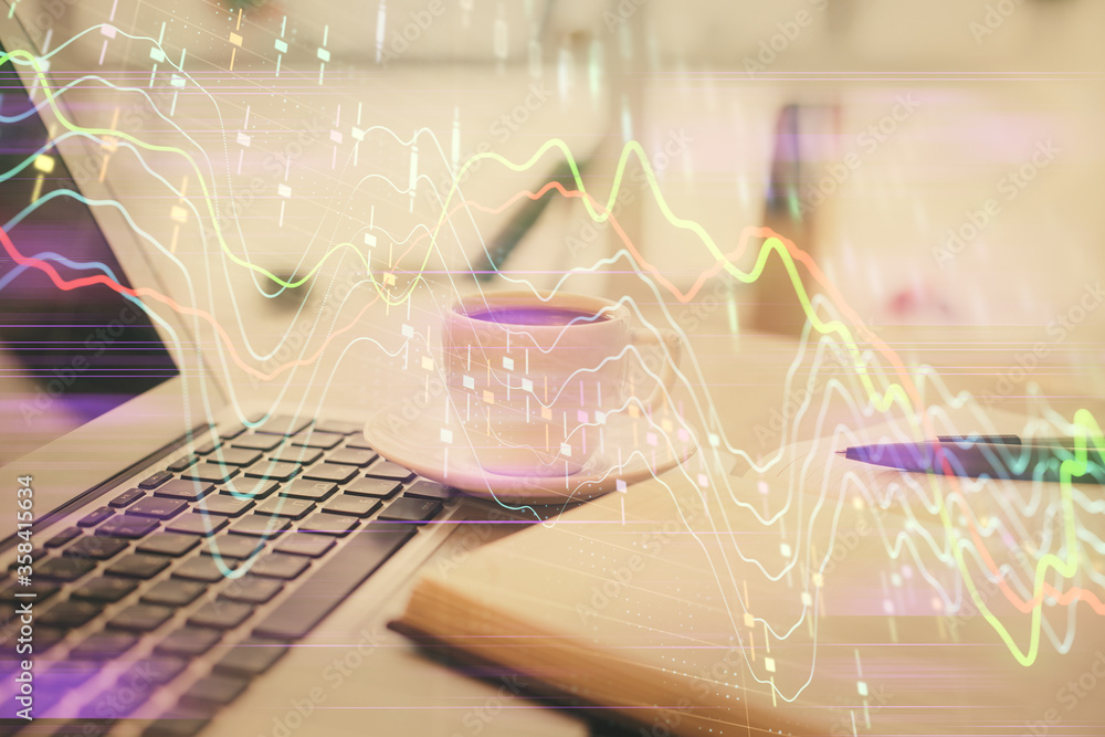 Double exposure of financial chart drawing and desktop with coffee and items on table background. Concept of forex market trading Double exposure of financial chart drawing and desktop with coffee and items on table background. Concept of forex market trading