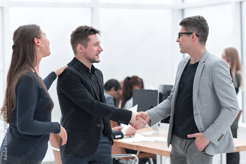 business people meeting each other with a handshake. business people meeting each other with a handshake.