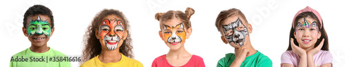 Valokuva Funny African-American boy with face painting on white background