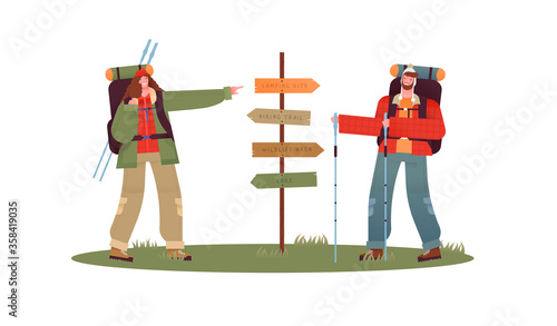 Man woman hiking at travel guidepost isolated