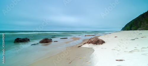 Natural landscape from the sea on a cloudy windy day.