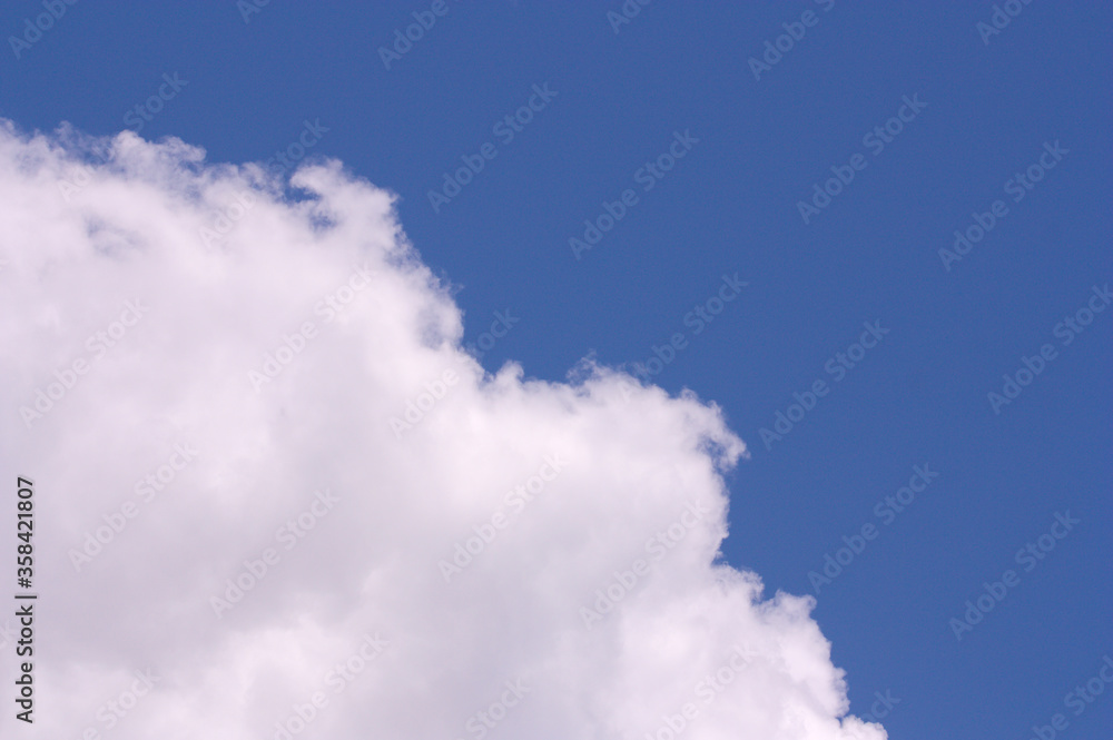 Image of storm threatening clouds in blue sky Image of storm threatening clouds in blue sky