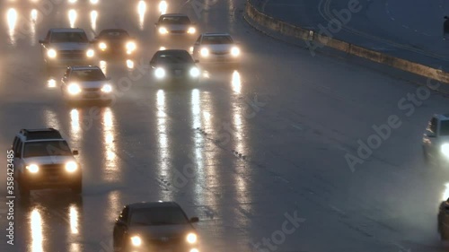 Traffic passing through rain downpour on the 118 freeway in the Chatsworth neighborhood of Los Angeles, California.