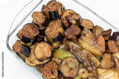 Turkish Food Fried, Aubergine or Eggplant Slices and potatoes on the glass plate.