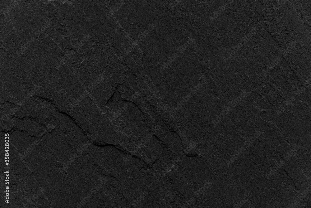 Dark grey black slate texture in natural pattern with high resolution for background and design art work. Black stone wall Dark grey black slate texture in natural pattern with high resolution for background and design art work. Black stone wall