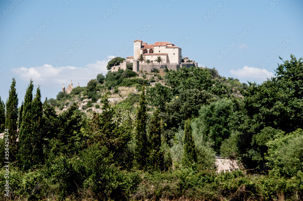 Church, village and mountain landscape in Arta, Majorca