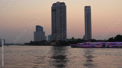 Sunset Bangkok Chaophraya river with city town views photo