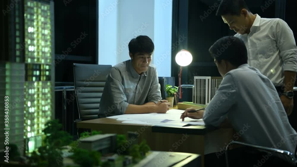 Business concept. Engineers are meeting in the office seriously. 4k Resolution. Business concept. Engineers are meeting in the office seriously. 4k Resolution.