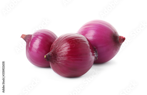 Fresh red onion bulbs isolated on white