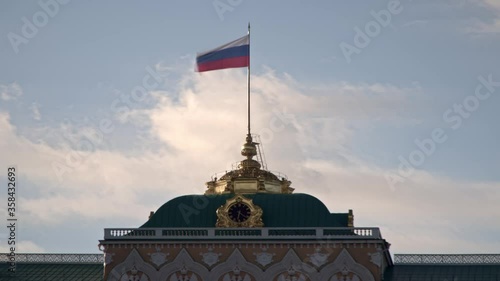 State flag of the Russian Federation over the Grand Kremlin Palace, the ceremonial residence of the President of Russia time lapse