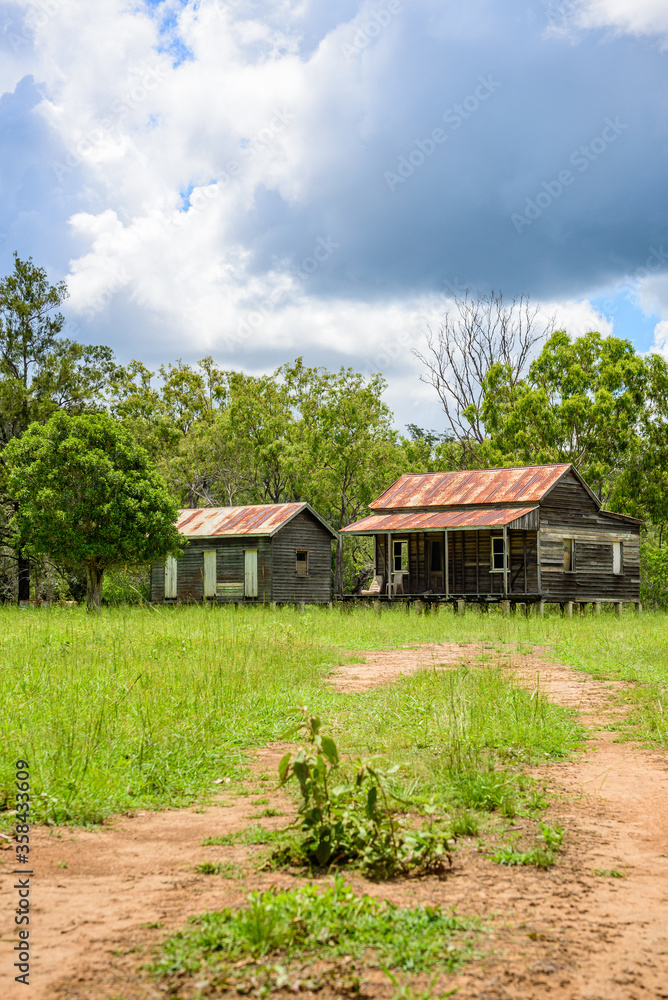 disused homestead in the middle of a green field in Kroombit Tops National Park, Queensland disused homestead in the middle of a green field in Kroombit Tops National Park, Queensland