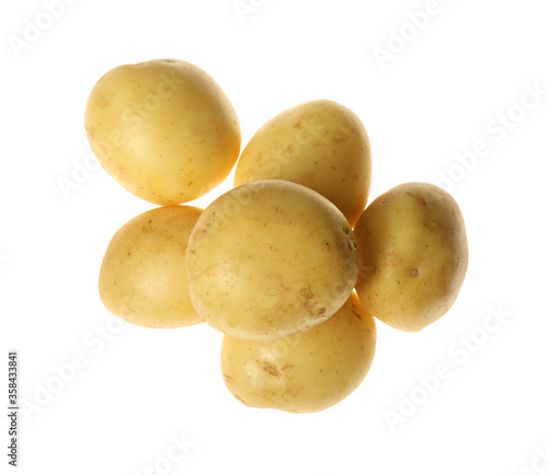 Fresh raw organic potatoes on white background  top view