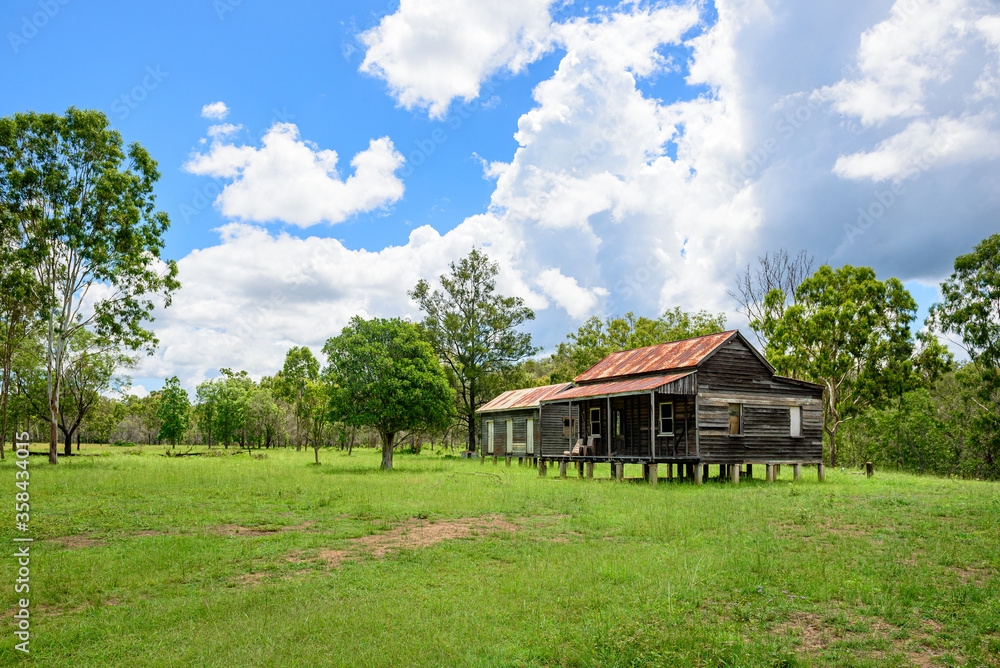 disused homestead in the middle of a green field in Kroombit Tops National Park, Queensland disused homestead in the middle of a green field in Kroombit Tops National Park, Queensland