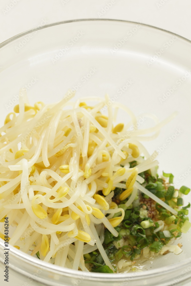 Korean cooking, boiled soy bean sprout and seasoning, green onion Korean cooking, boiled soy bean sprout and seasoning, green onion