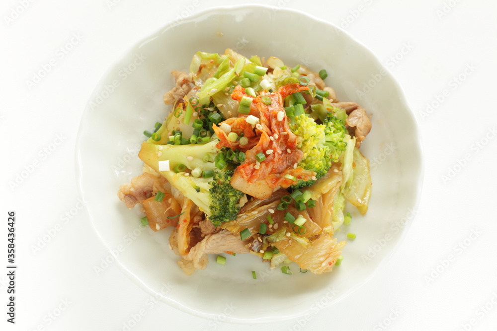 Korean food, broccoli and kimchi stir fried with cabbage and pork