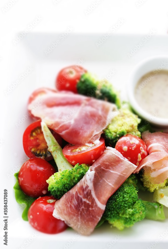 Cherry tomato, broccoli and ham with vegetable salad Cherry tomato, broccoli and ham with vegetable salad