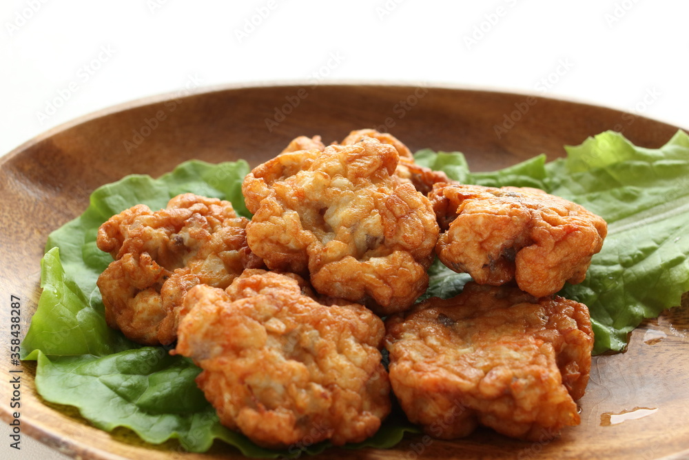Chinese food, fish cake on lettuce with copy space Chinese food, fish cake on lettuce with copy space