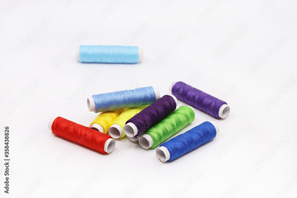 threads and buttons of various colors threads and buttons of various colors