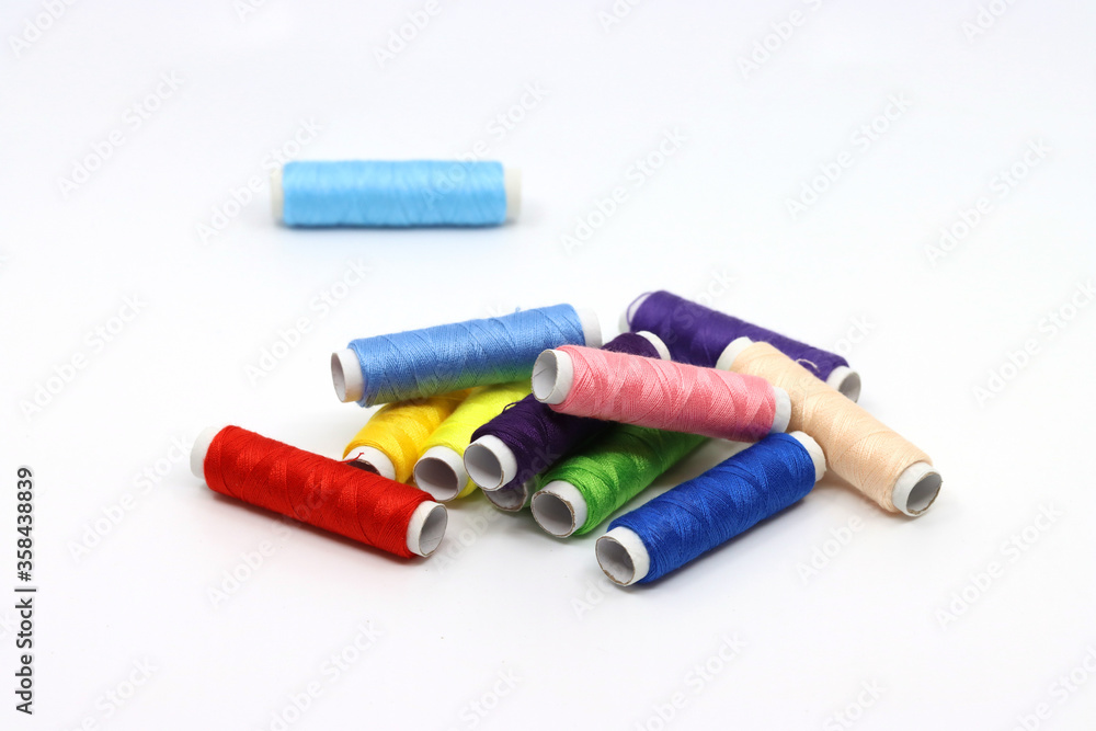 threads and buttons of various colors threads and buttons of various colors