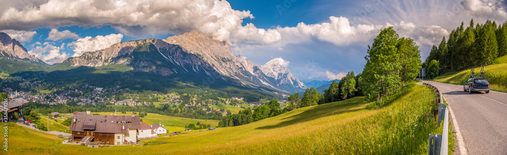 Mountains with alpine village on sunny summer day, the Dolomites Mountains, Italy
Mountains with alpine village on sunny summer day, the Dolomites Mountains, Italy