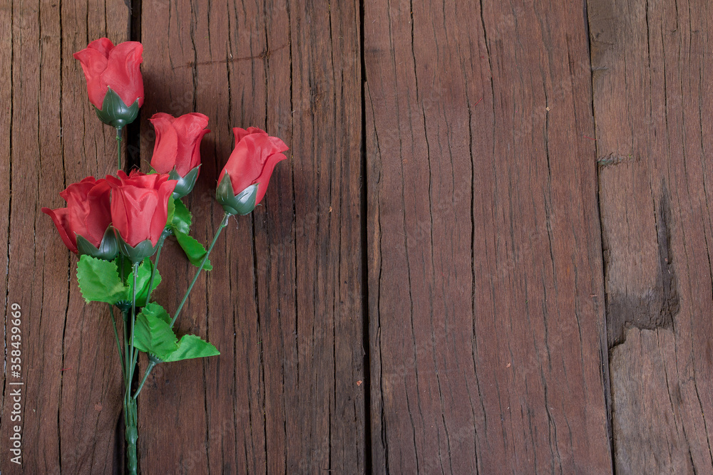 A roses on the wooden Background